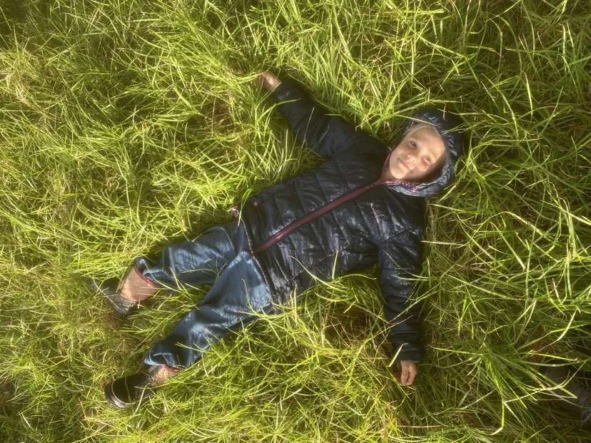 kid in grass.jpg