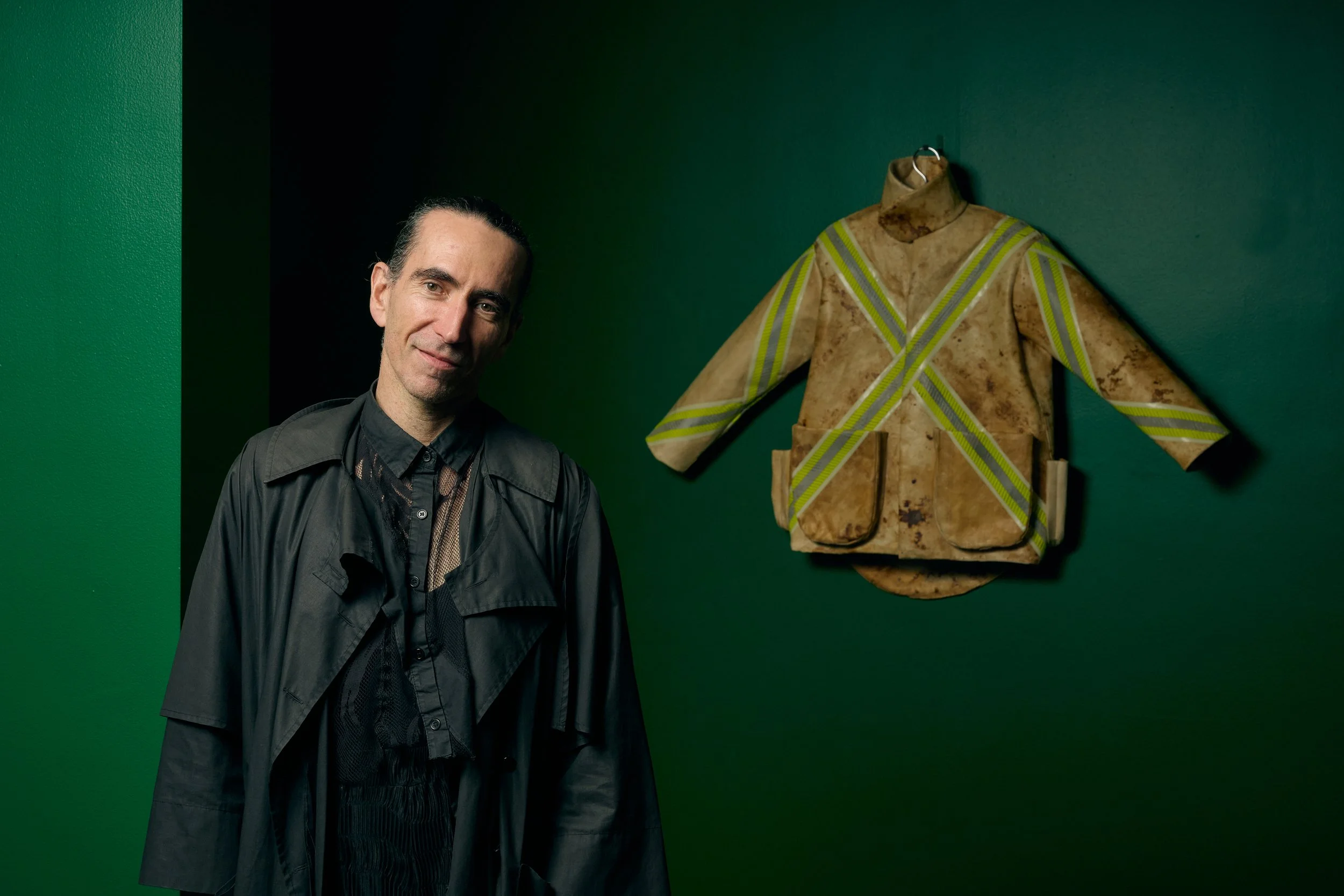 Portrait of Alexi Freeman with the work Mycelium Wildfire Jacket in Plant Life: The Nature of Design on display from 28 August 2026 to 7 February 2027, at The Ian Potter Centre: NGV Australia, Melbourne. Photo: Eugene Hyland.