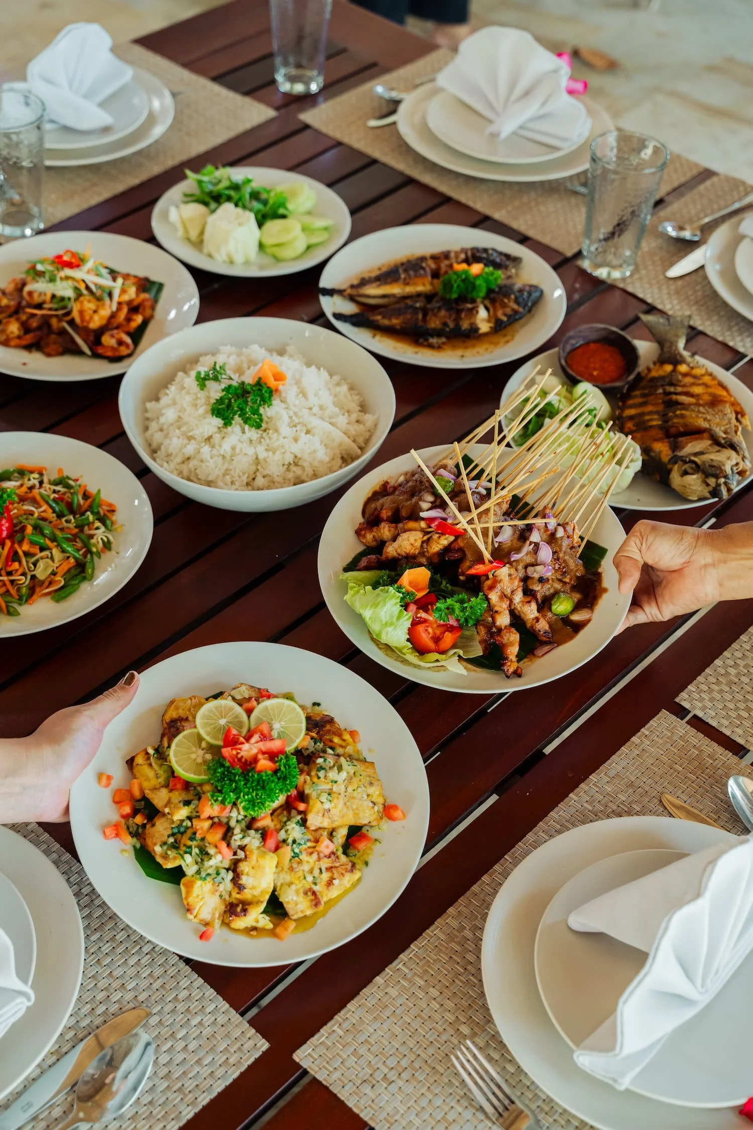 villa-wilali-villa-side-food-on-table-two-hands-1500w75q.jpg