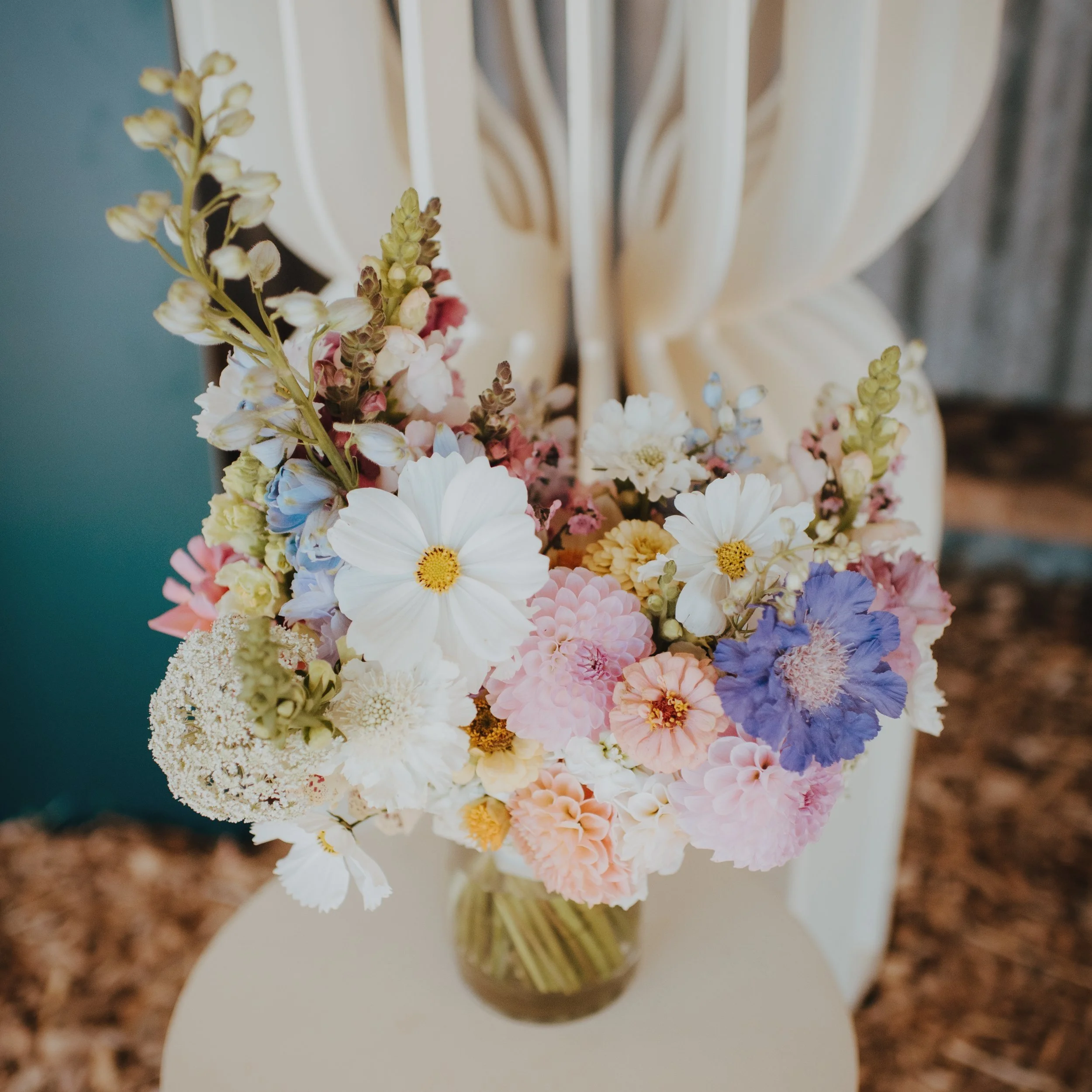autumnal bouquet with pastel pinks and blues