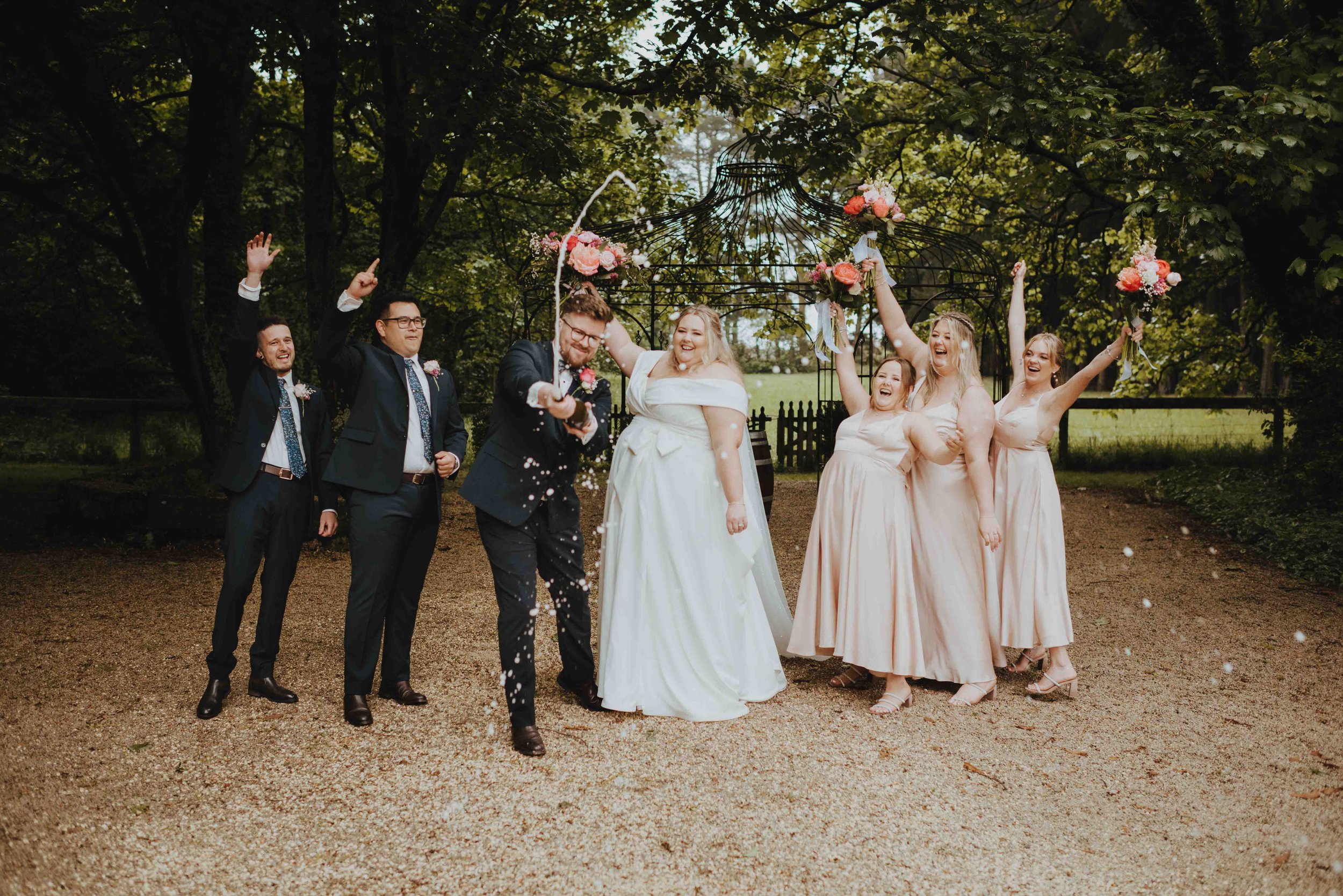 bridal party celebrating bridal party celebrating