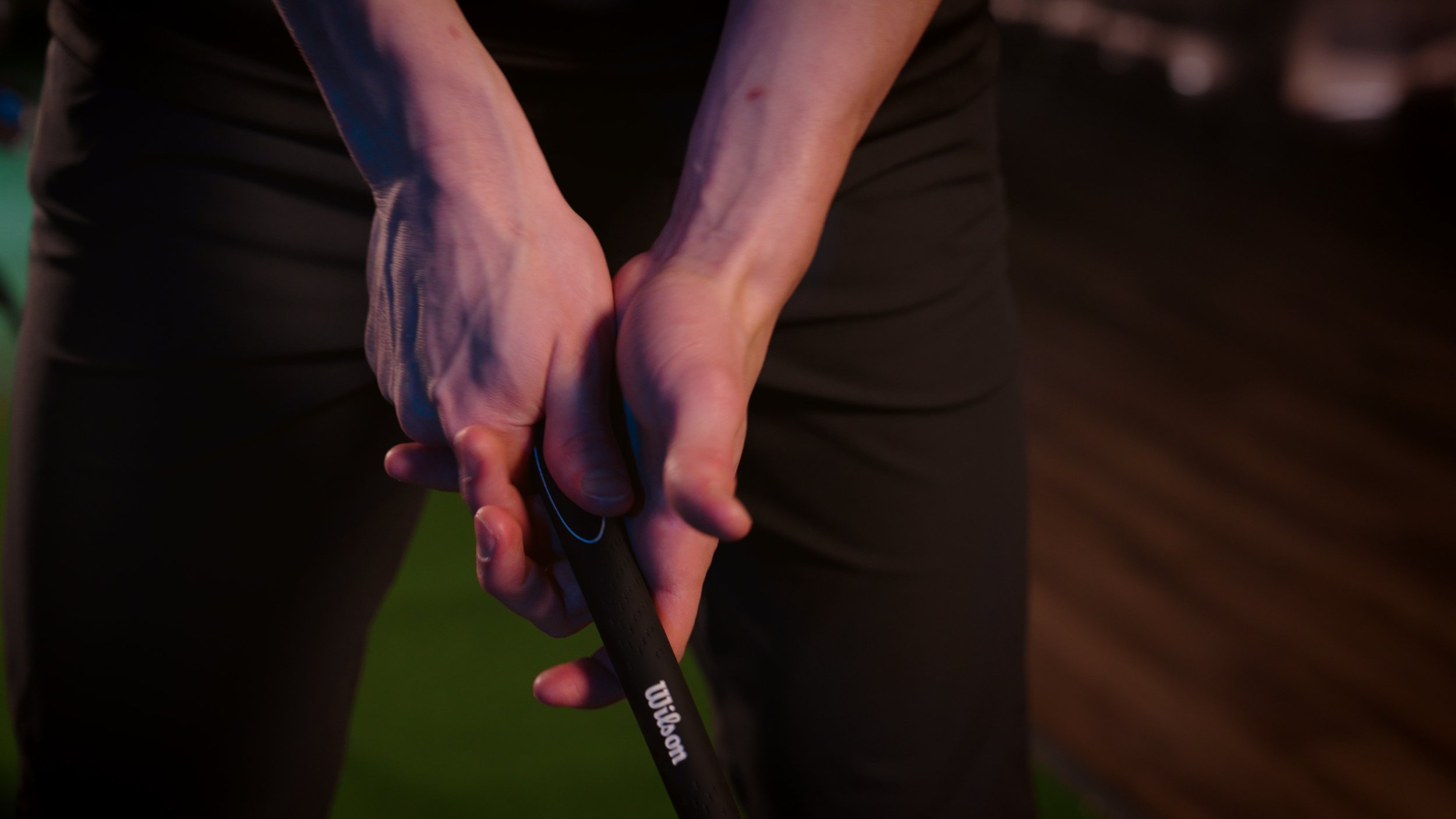 Ivan Demidov lining up his golf swing.