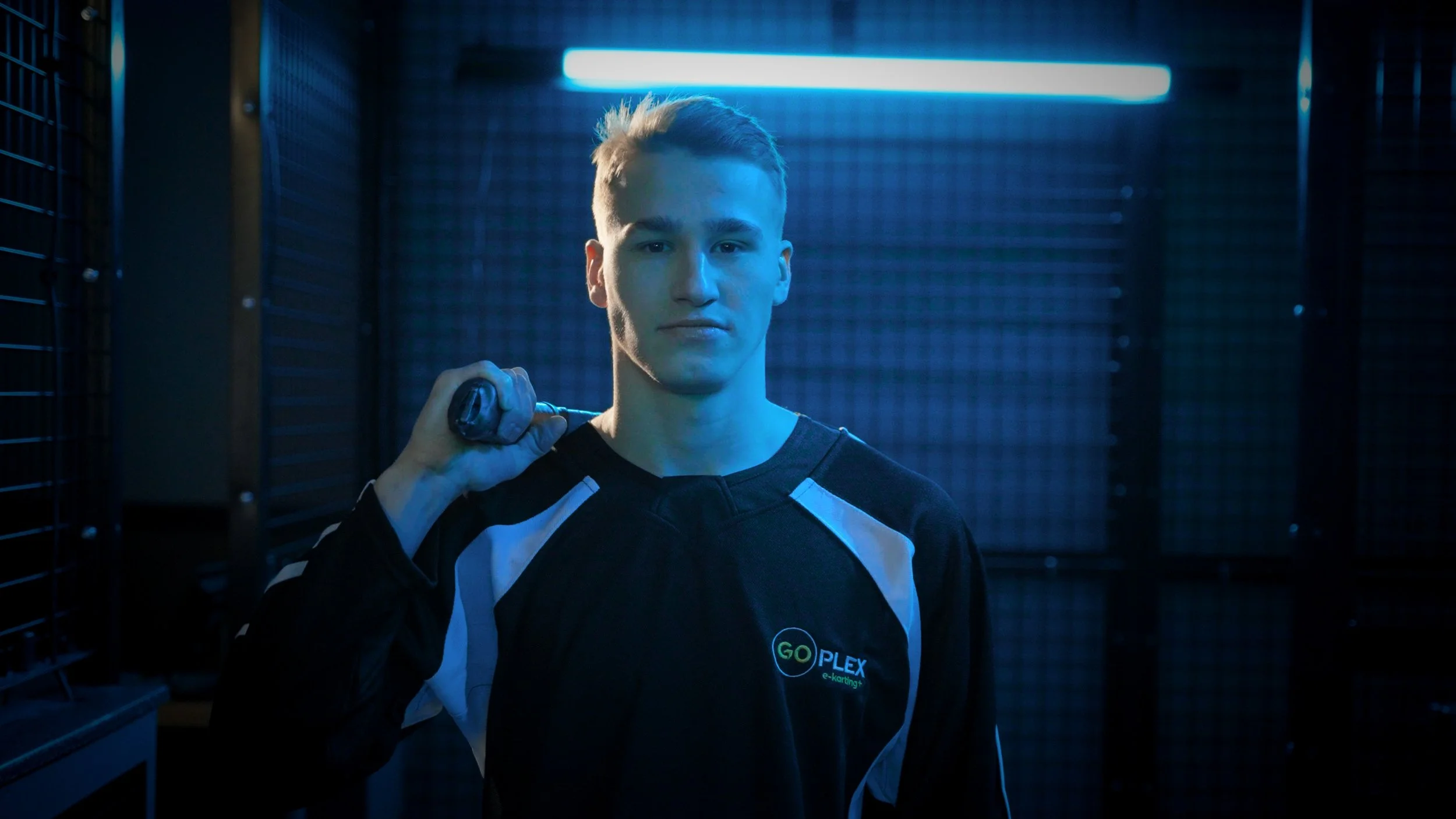 Ivan Demidov holding a throwing axe.