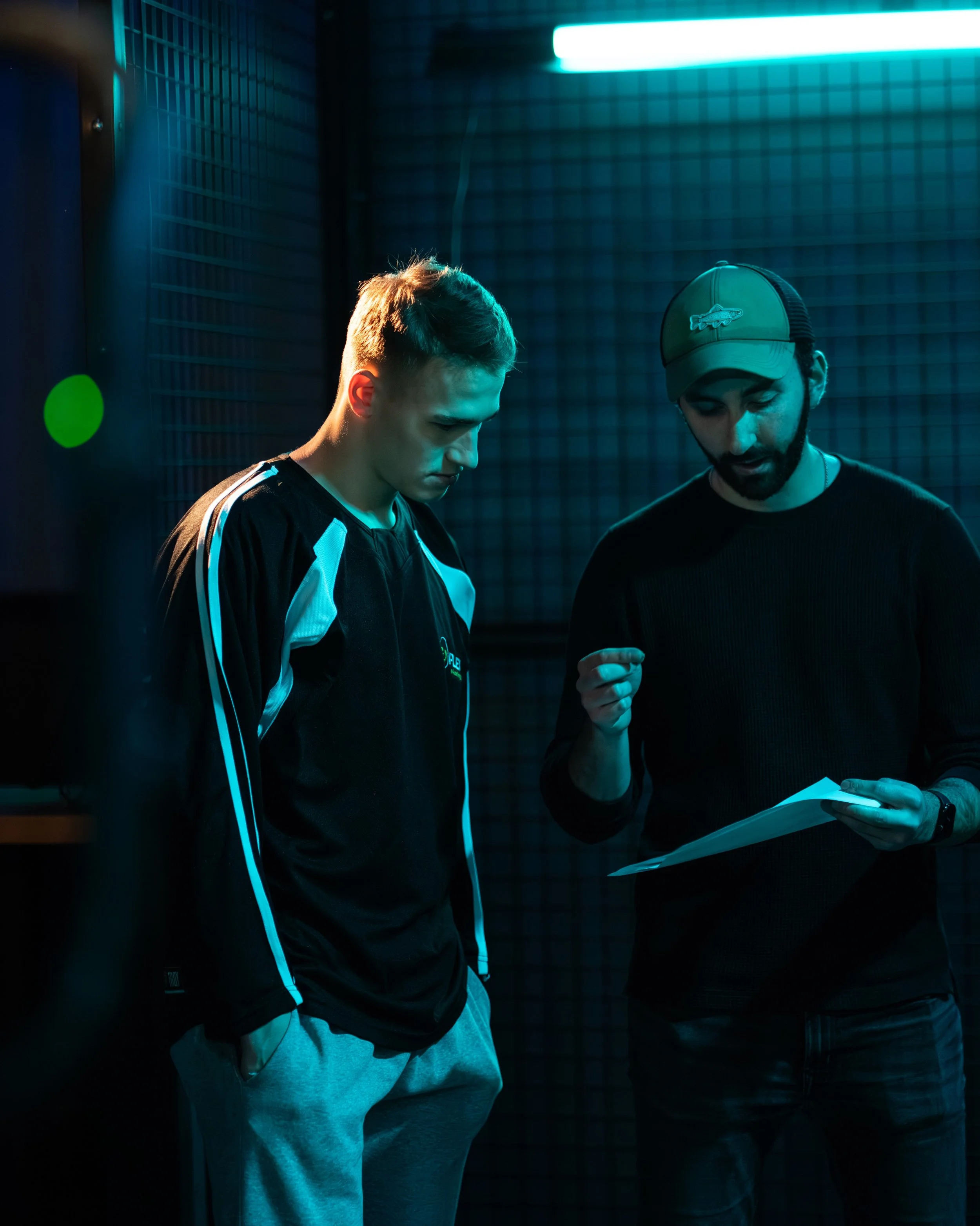 Ivan Demidov standing with director Kai Washer during the filming of his commercial for GoPlex