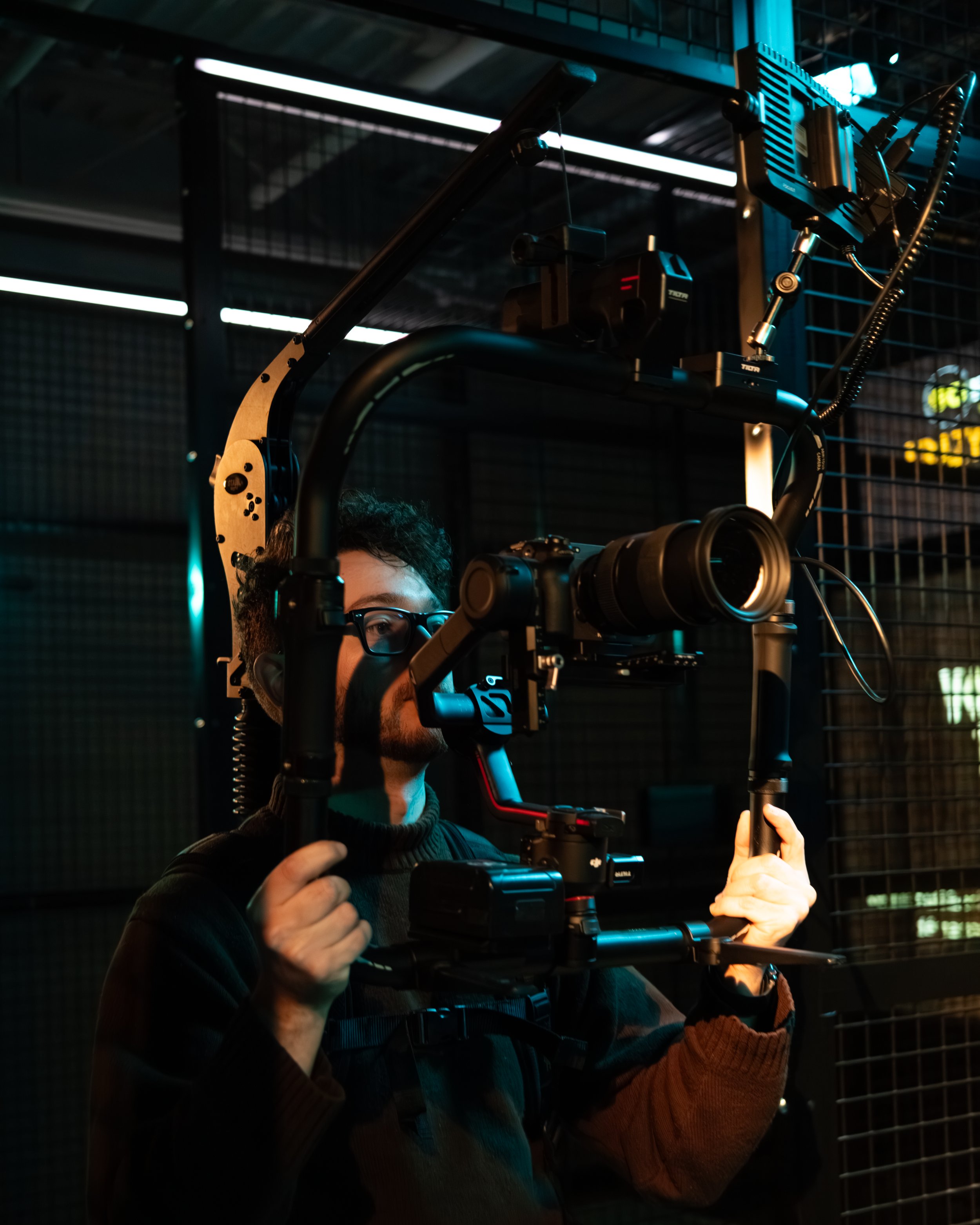 DP René Arseneau holds a camera rig during the filming of the GoPlex x Demidov commercial