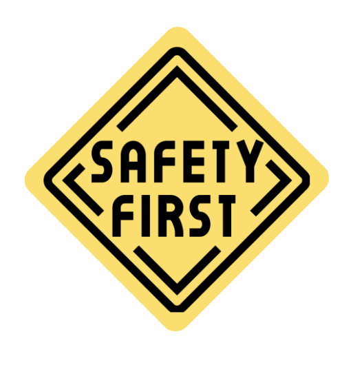 Yellow safety sign with black text that says 'Safety First'.