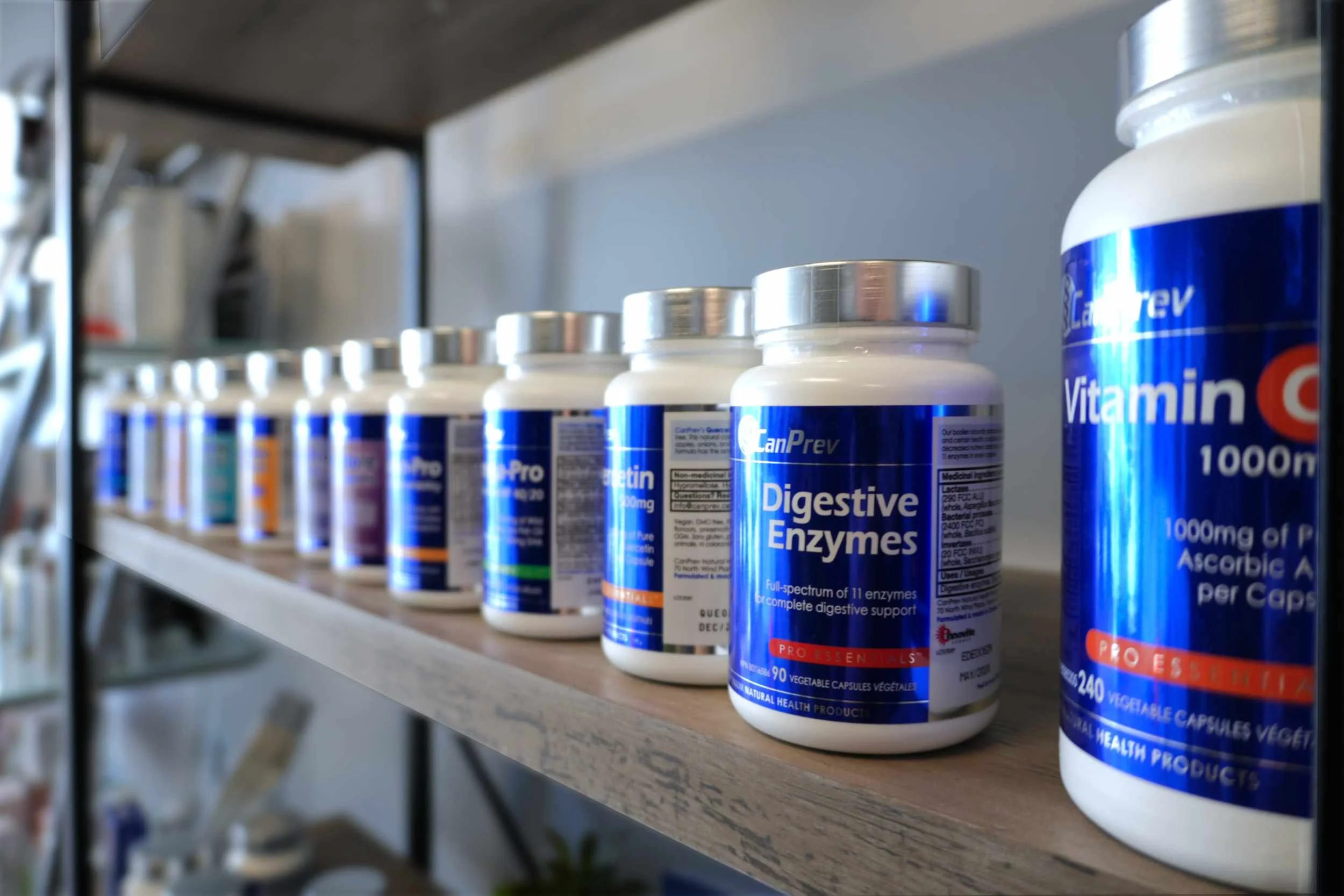 CanPrev products aligned on a shelf at Aston Wellness Clinic.