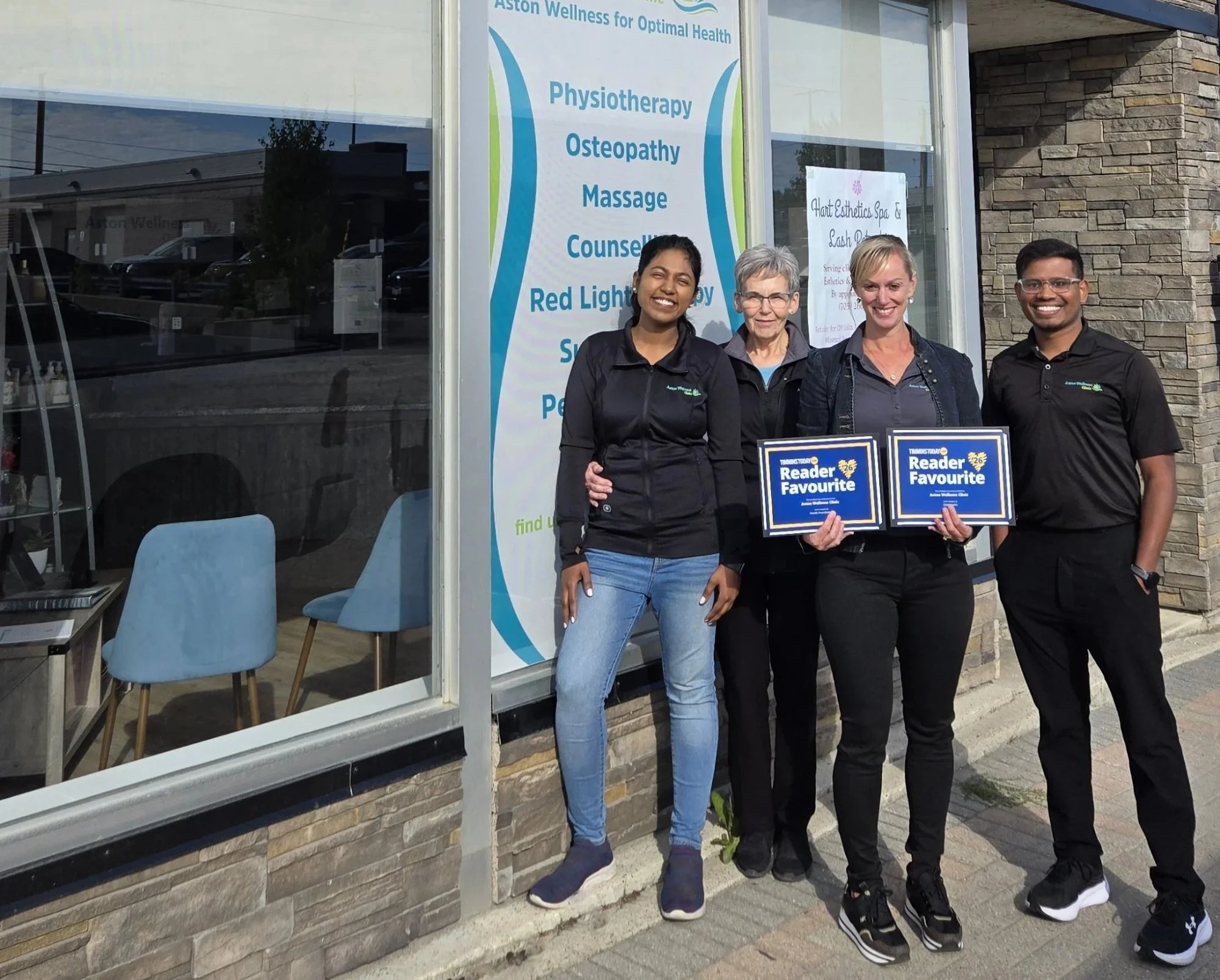 Some of the Aston Team in front of the clinic.