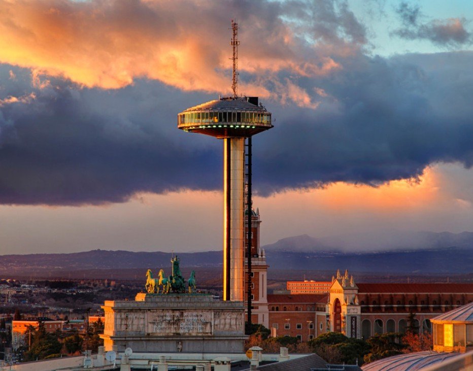 The Stratosphere Tower in Las Vegas during sunset with dramatic clouds in the sky.