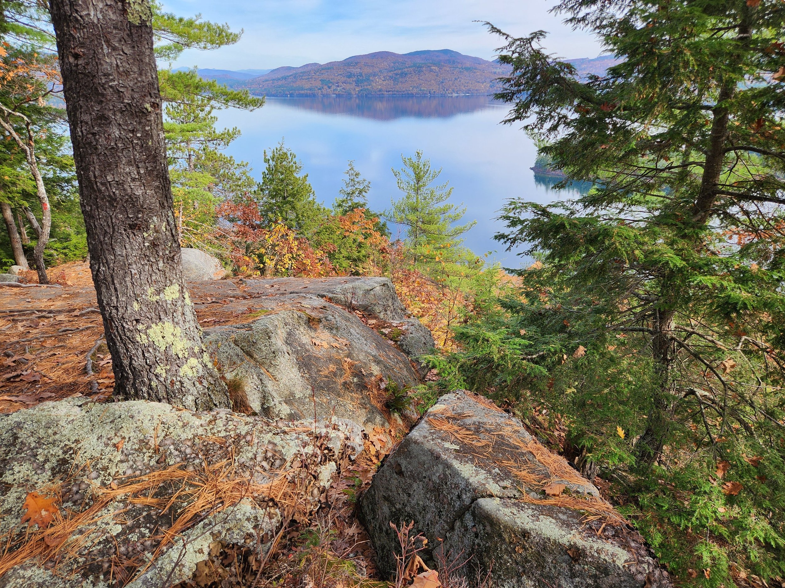 A sublime view of Newfound Lake from Little Sugarloaf mountain in Alexandria, New Hampshire, October 23, 2022