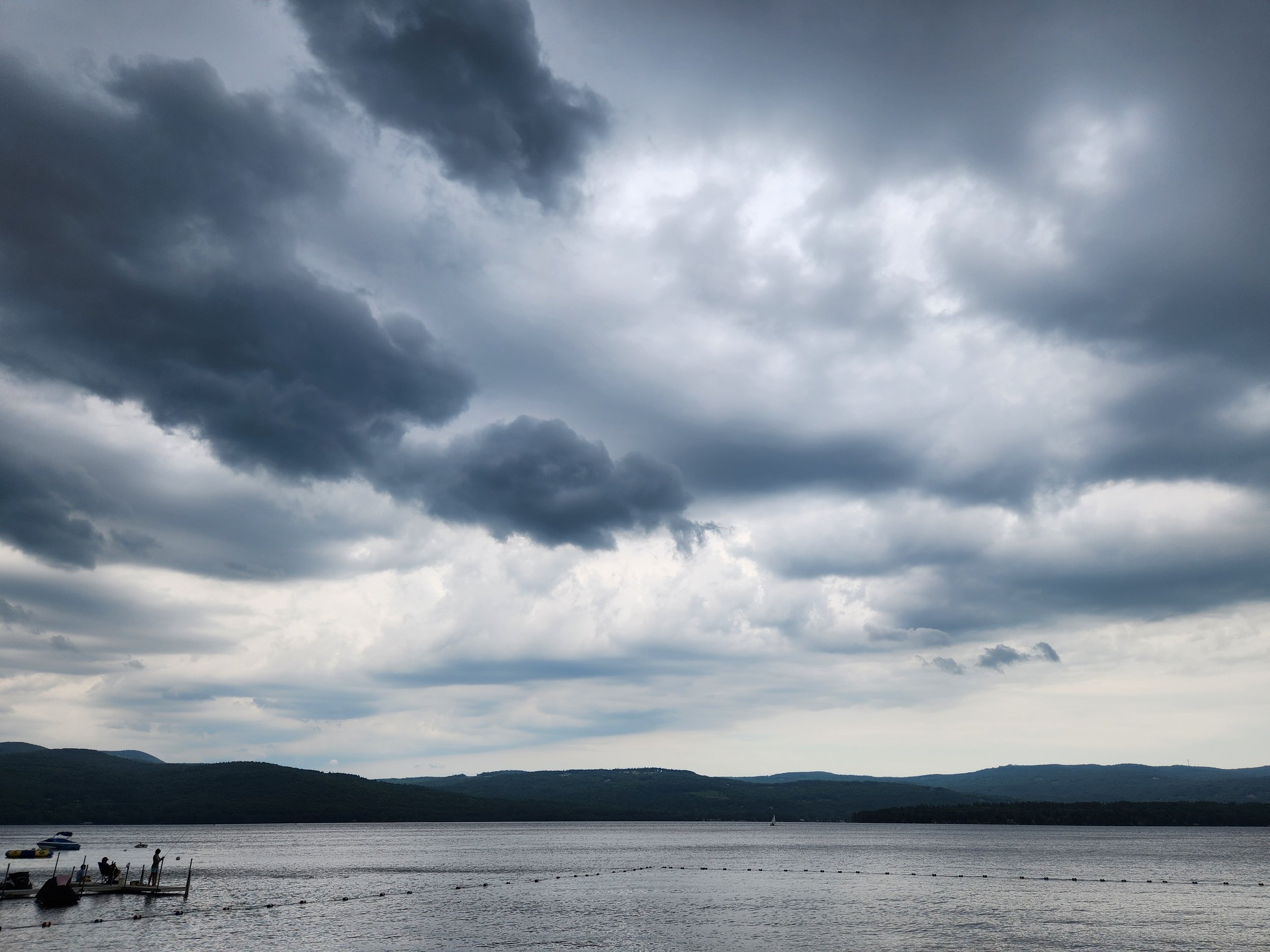 Dark clouds and fishing, Alexandria, July 7, 2023