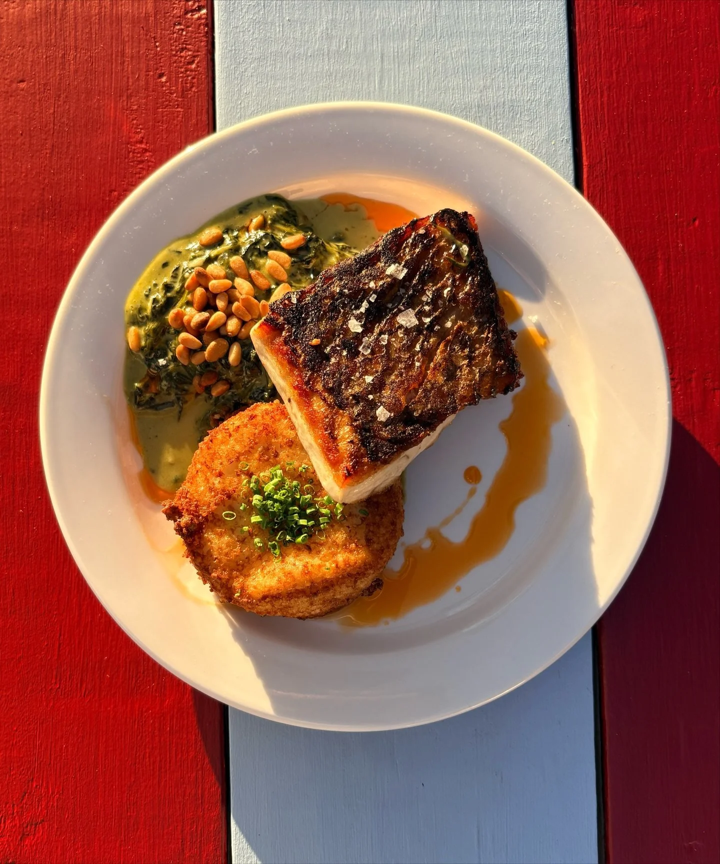 If you try one Fresh Catch at Cheeky&rsquo;s, make it this.

Seared Red Fish with fried grits, creamy spinach, toasted pine nuts, and a hit of paprika oil. 

Mild, white-flaky, and honestly one of the best pieces of fish we&rsquo;ve served yet.

Sust