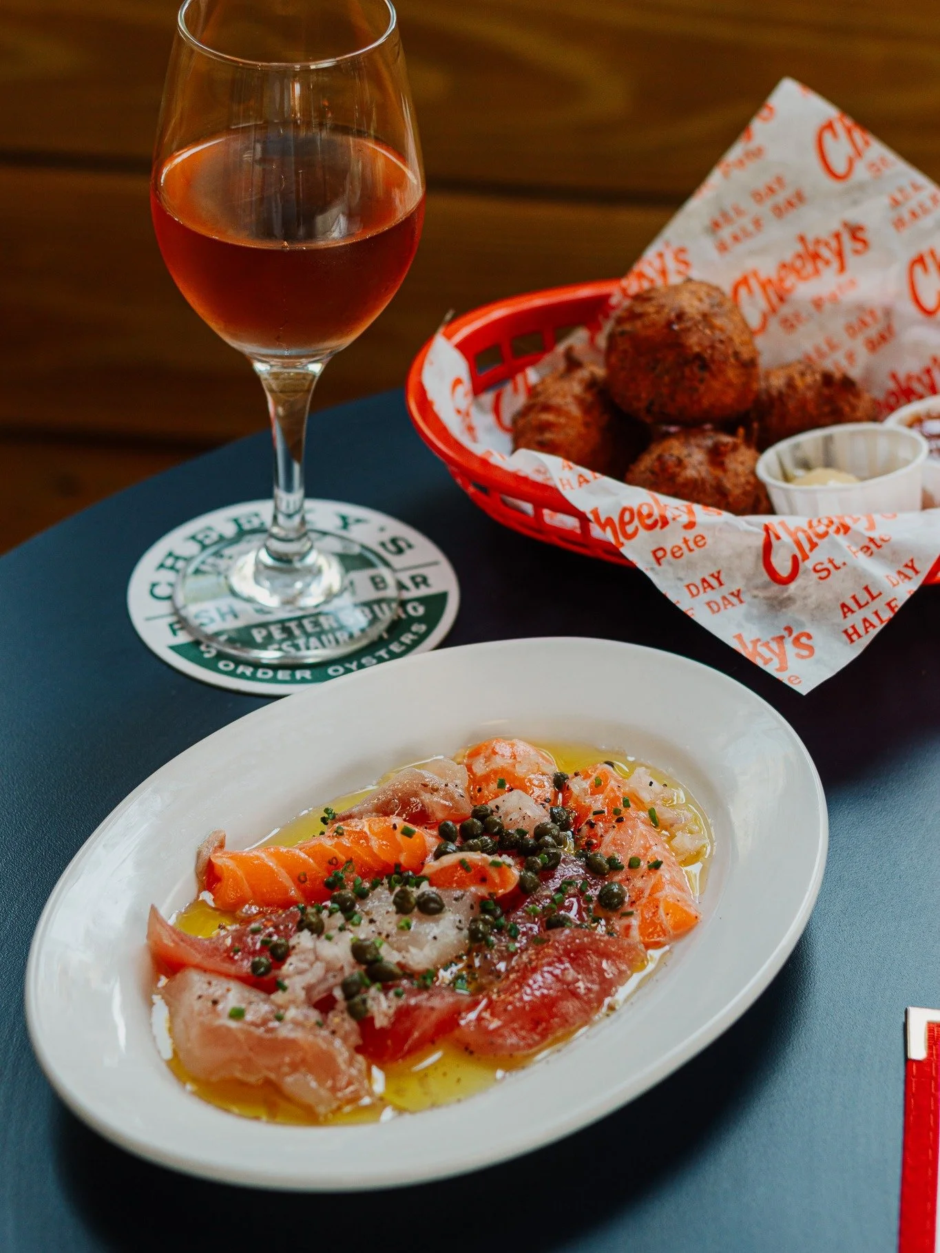 Cheeky's serves up fresh seafood classics from local waters and the Gulf&mdash;East Coast and Florida oysters, buttered lobster rolls, po-boys on authentic New Orleans Leidenheimer bread, smoked fish dip, and lots of Florida shrimp. 

We've got lots 