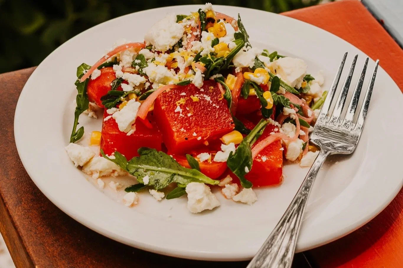 Watermelon salad with grilled sweet corn, baby arugula and feta