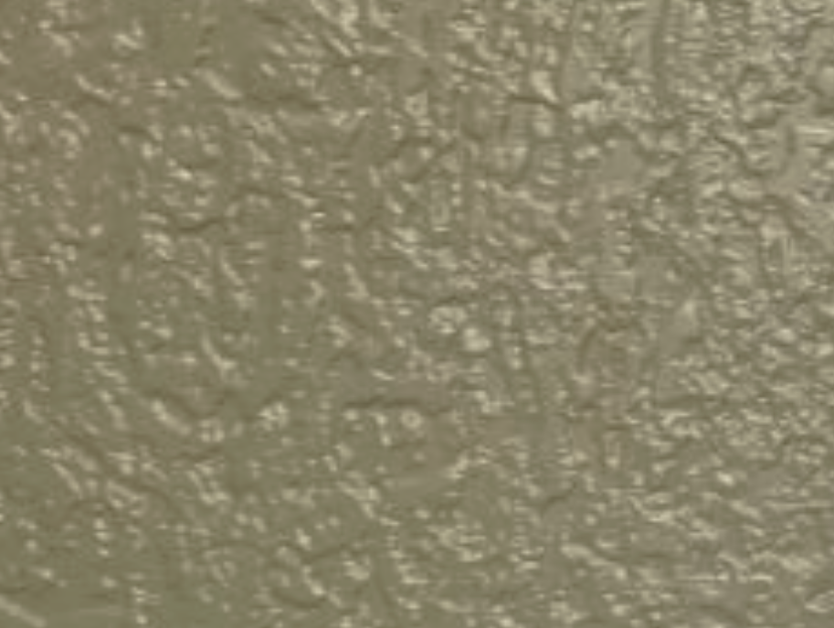 Close-up of textured wall surface with beige paint.