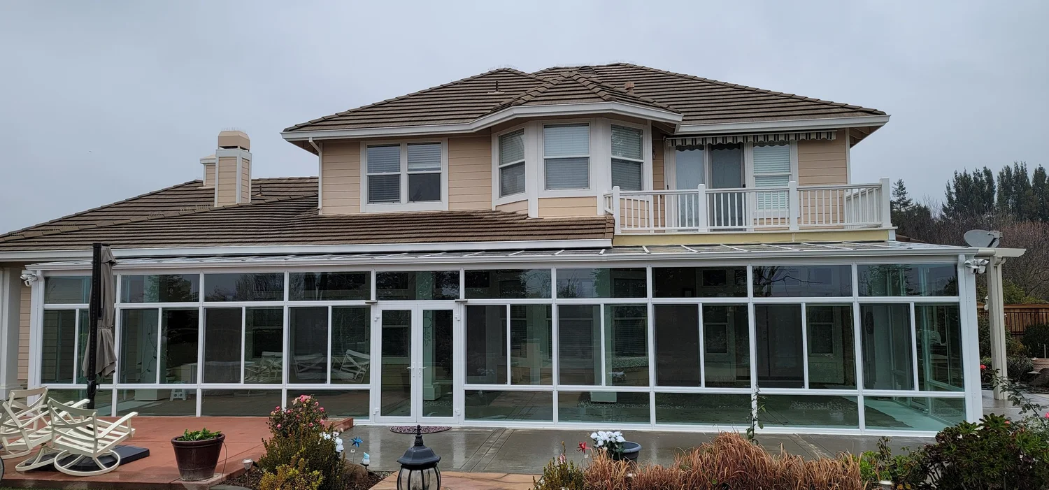 Glass sunroom enclosure