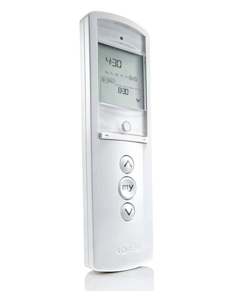 White remote control with digital display and buttons for Somfy devices