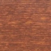 Wood grain texture with a reddish-brown color