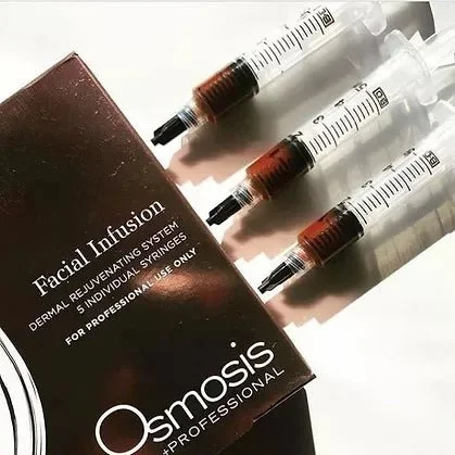 Facial infusion product package and three filled syringes for dermal rejuvenation by Osmosis Professional.