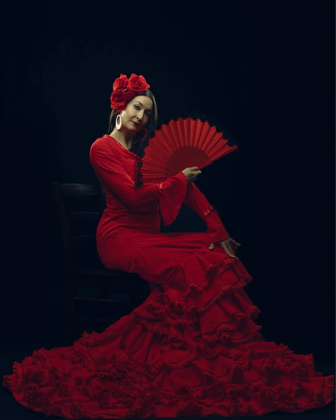 red bata dress with fan facing front.JPG