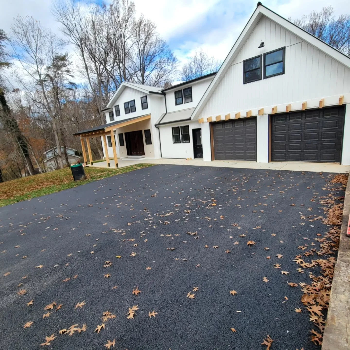 Wow! A finishing touch (asphalt) on this already beautiful home. Check out the before and afters.
