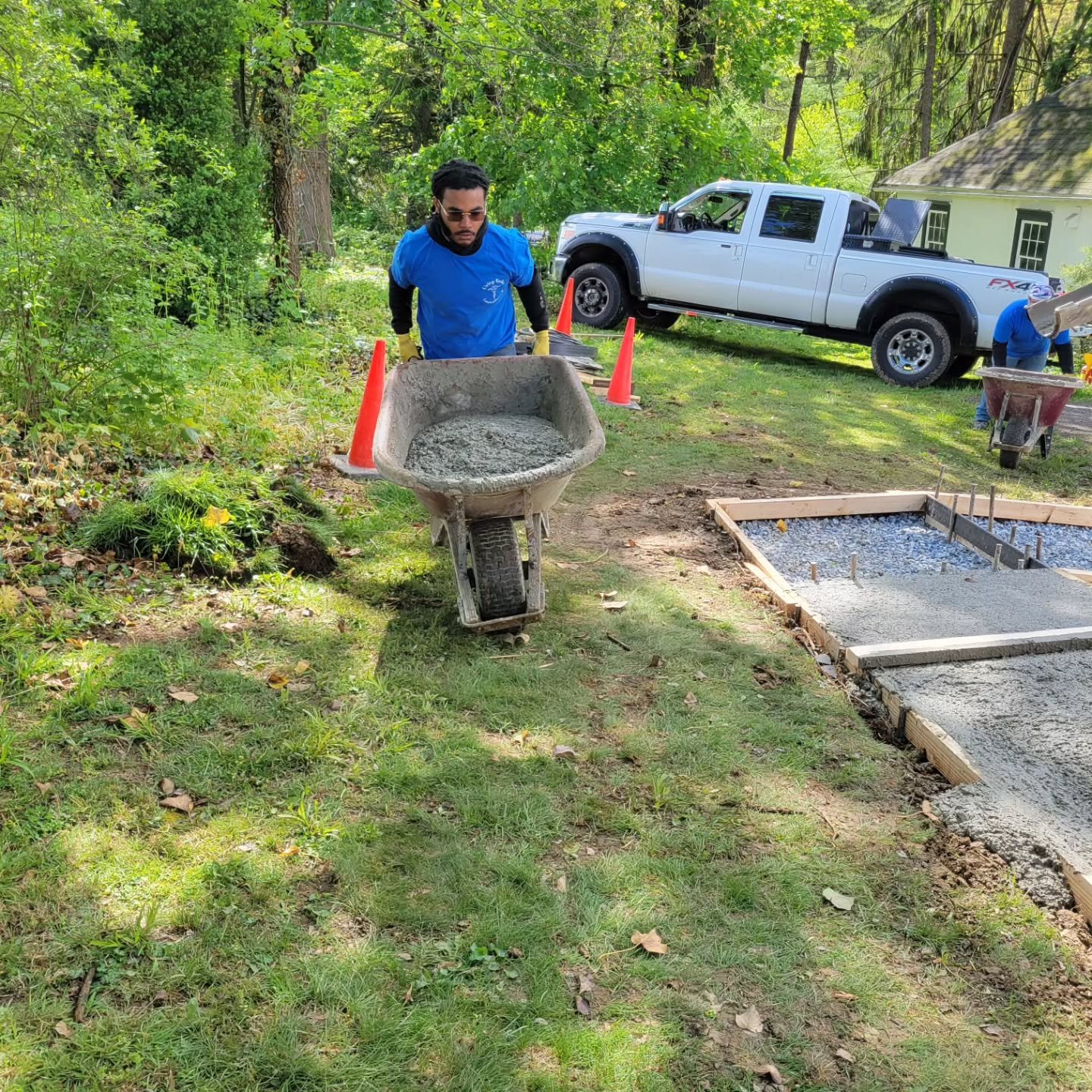 A tough pour today with crazy slopes, but we got it. 💪🏼And celebrating Jalil's first concrete pour 🥳 Thank you @pacareerlinklancaster!