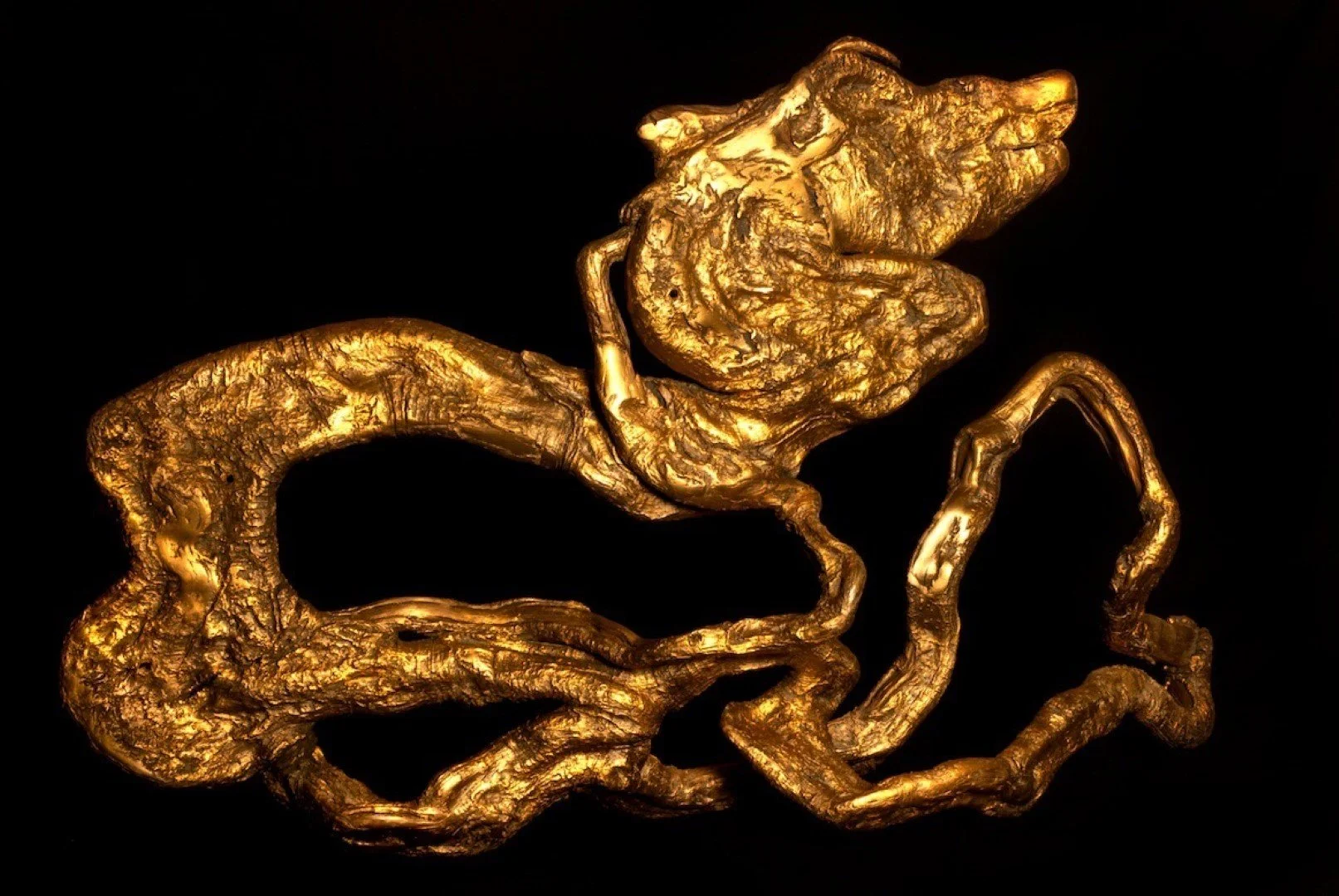 Broche en forme de cheval en or