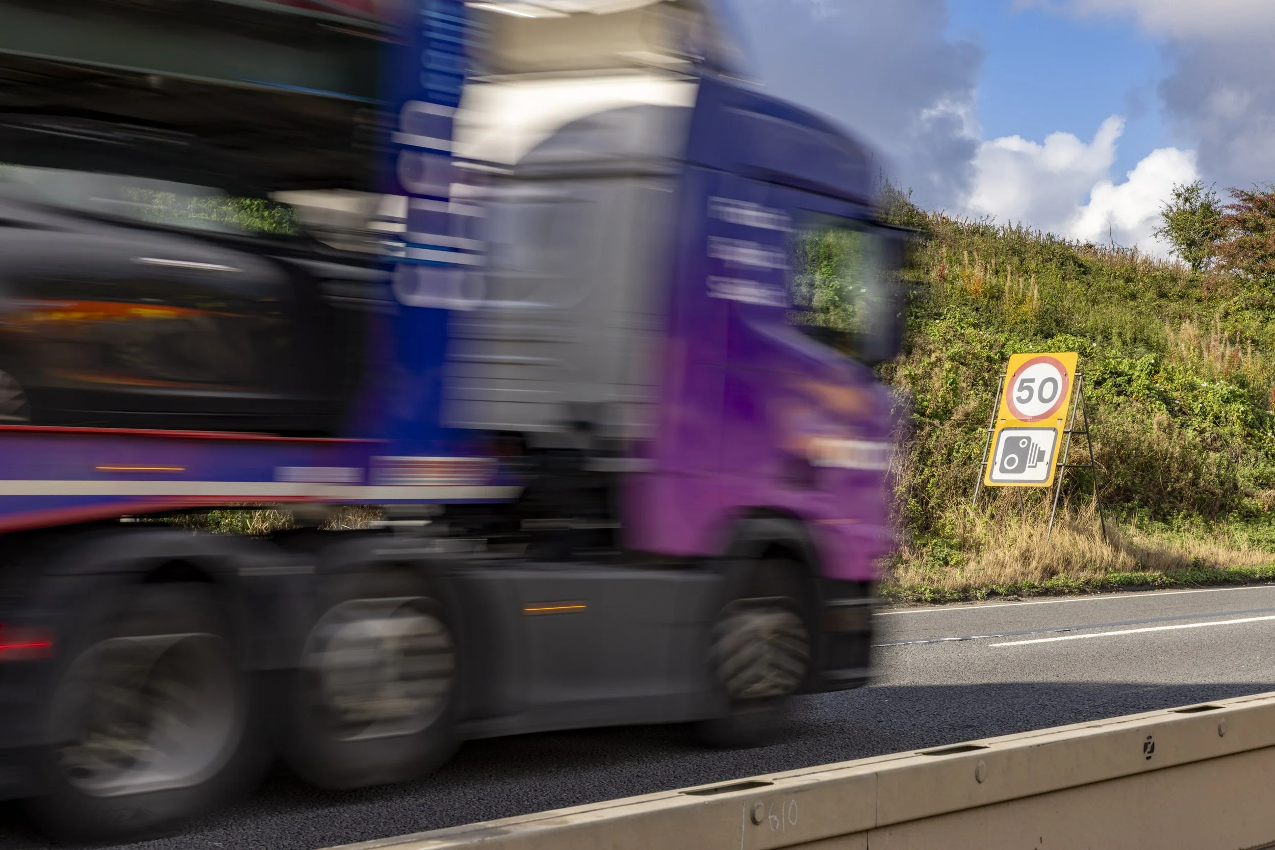 Fast lorry driving in a 50mph controlled area.