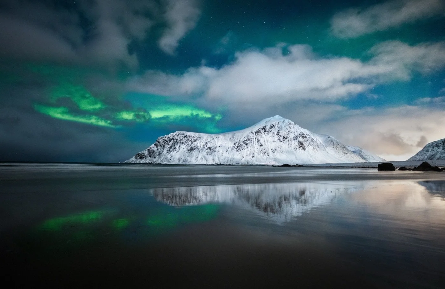 Aurora night at Skagsanden, Lofoten 
We were waiting a lot for solar activity, and finally, the sky came alive with soft green waves above the mountains. Being this far north made it feel even more special.
#Lofoten #Skagsanden #AuroraBorealis #North