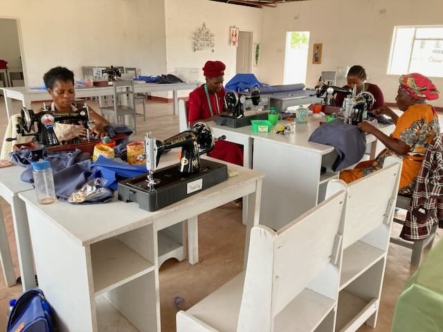 Women Sew Uniforms for First Class at Christian School of Hope