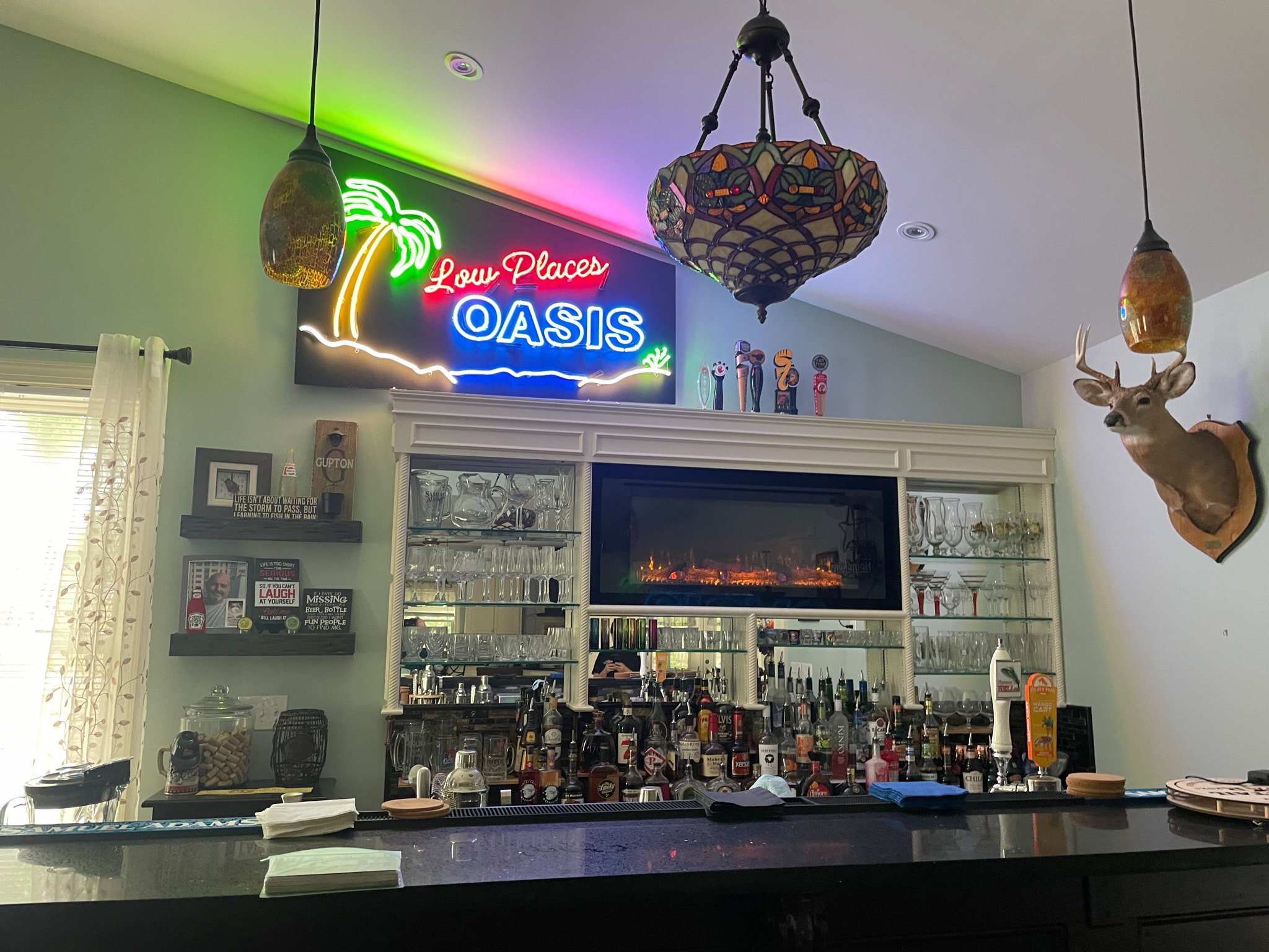 We also provided installation services at their home, fitting the sign into its new home 8-10 feet off the ground, over the bar. It makes a stunning focal point for their new space!