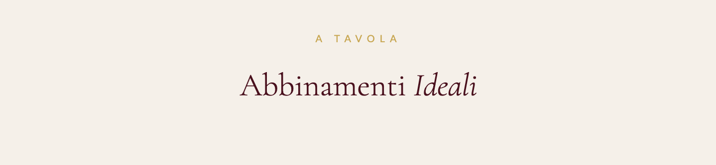 Testo su sfondo chiaro con parole italiane: "A TAVOLA Abbinamenti Ideali".