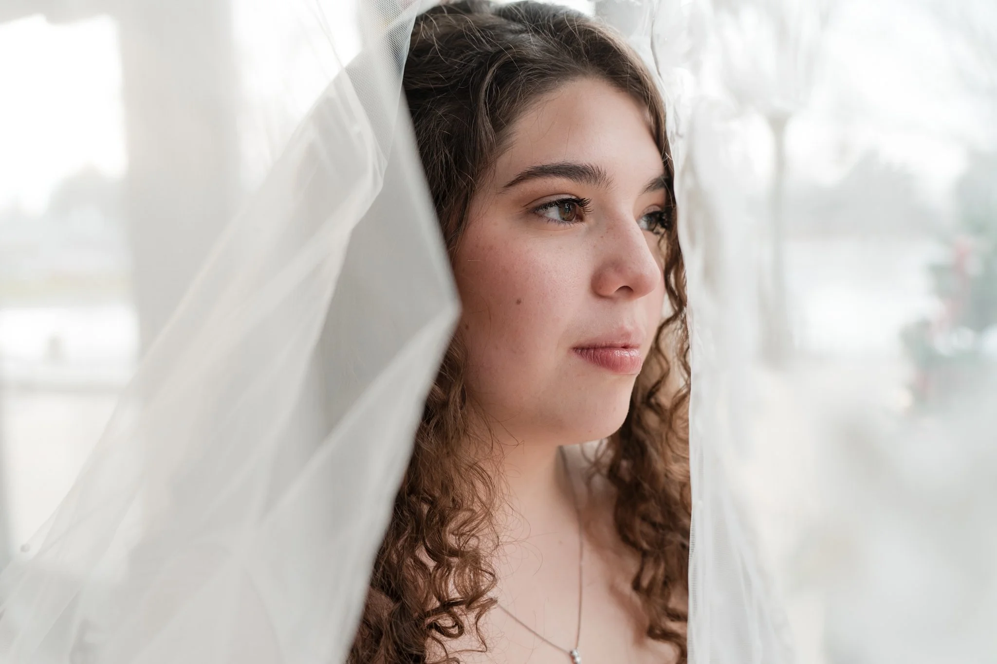 Portrait of a bride on her wedding day taking bridal portraits