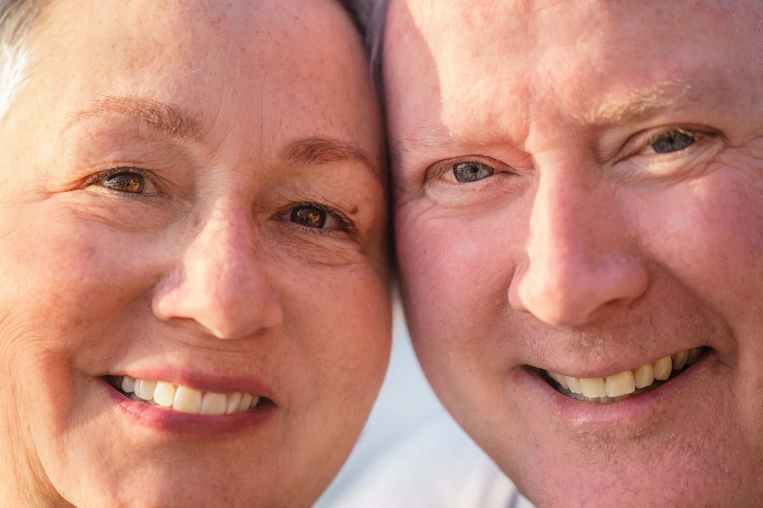 grandparents standing close together for a family portrait