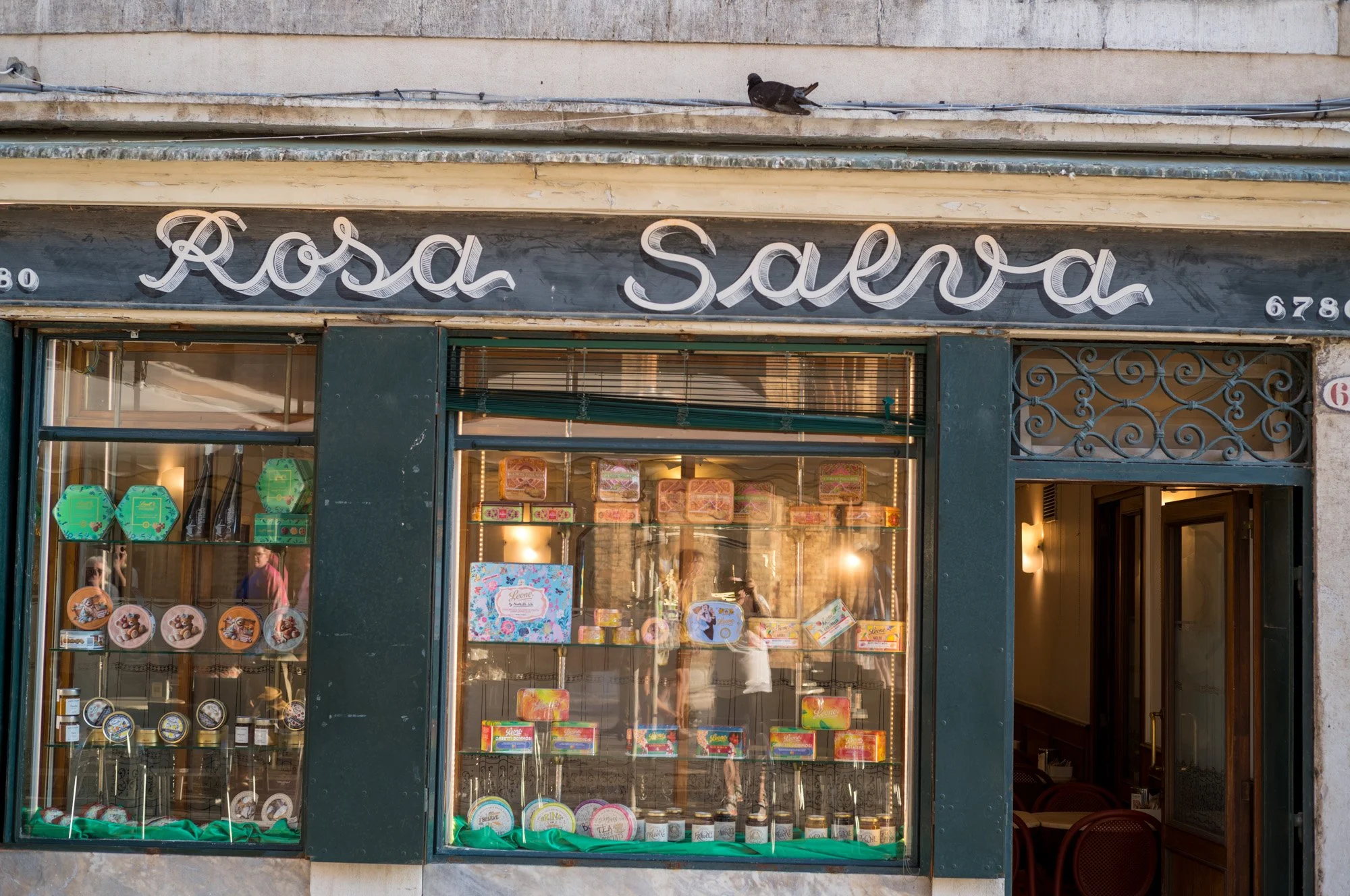 Hand-painted lettering on the façade of Rosa Salva in Venice, Italy.
