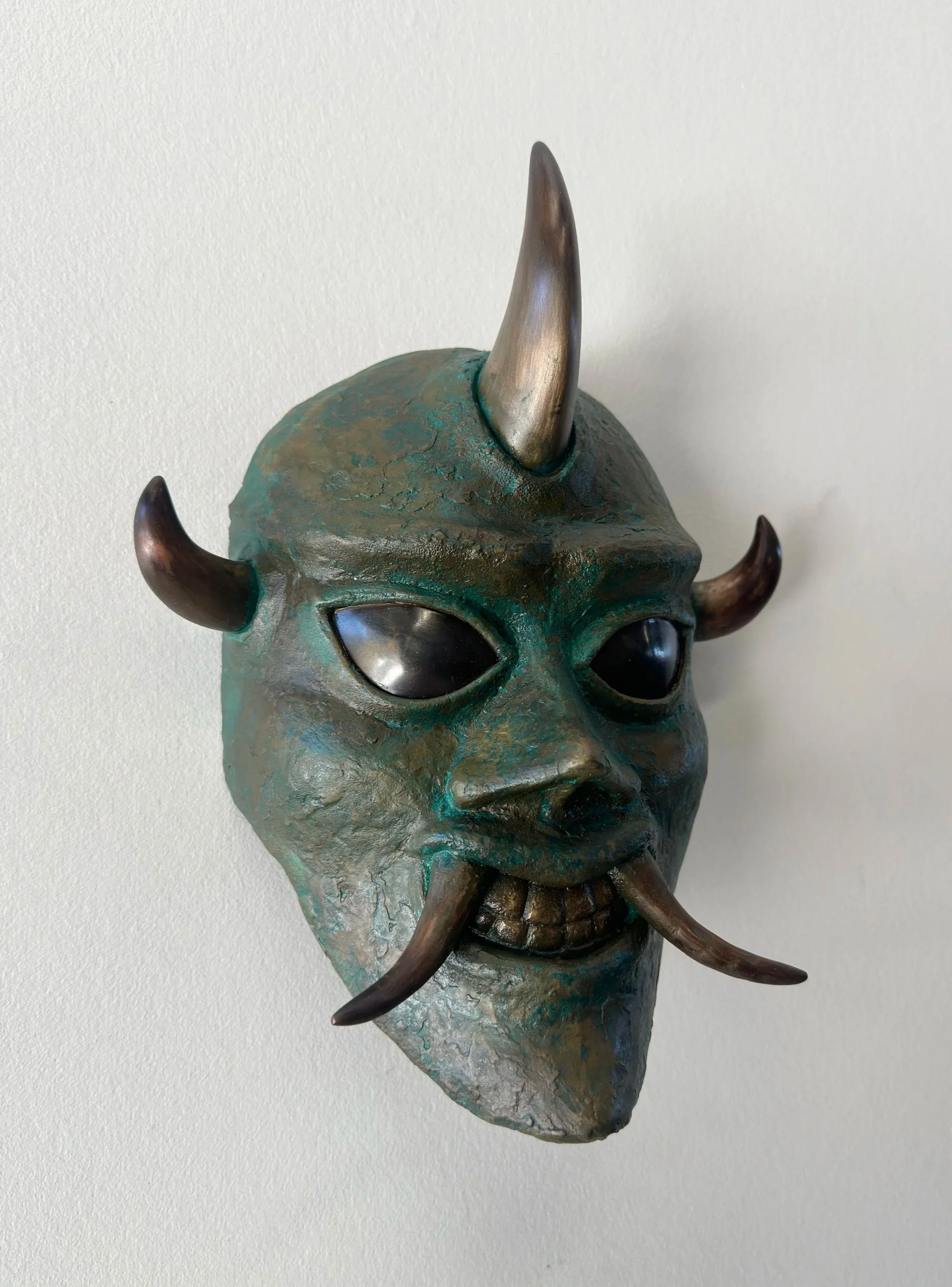 cast bronze wall sculpture by bay area sculptor alexander yoshikawa