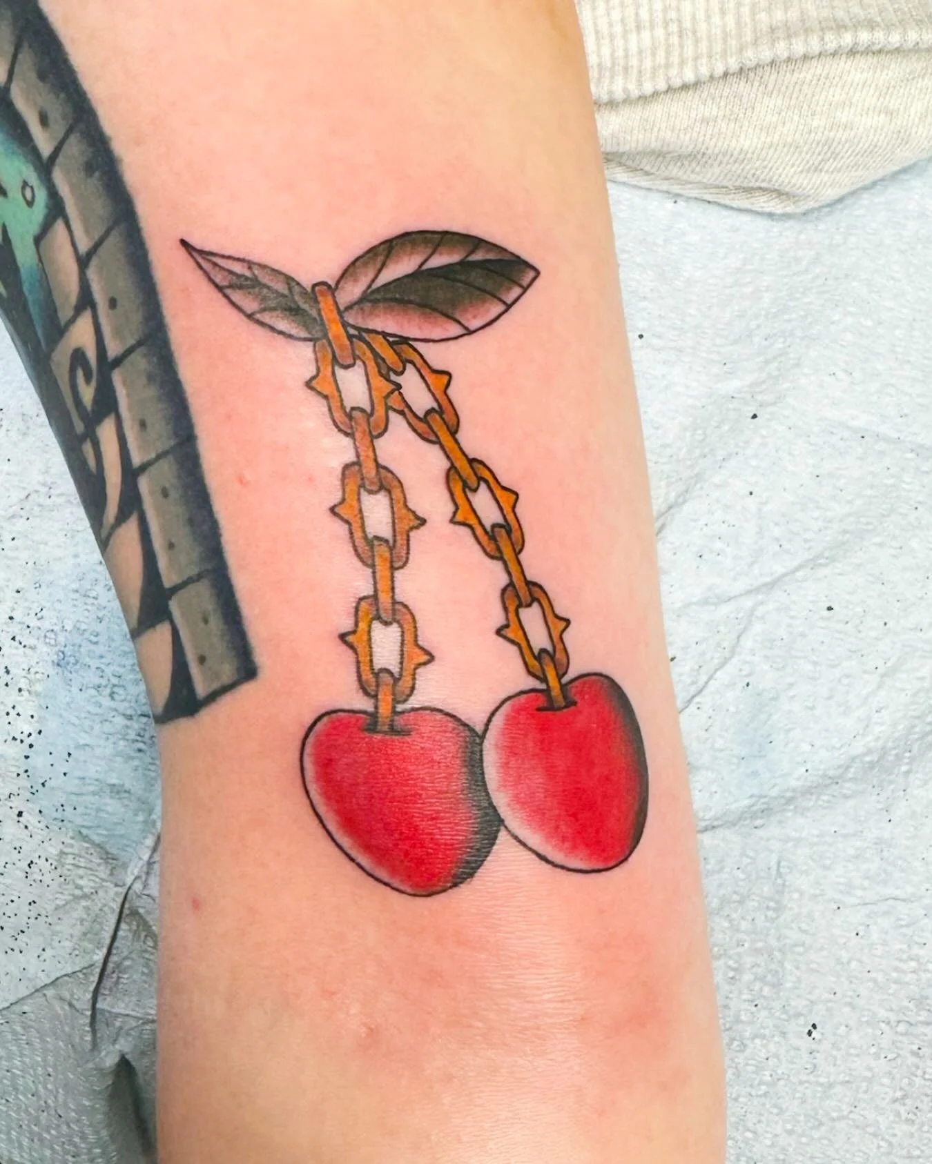 Couple of cherries and chains done by @john7homas_tbobs! 🍒

John is in the shop for walk-ins Wednesday, Thursday, and Friday every week!
