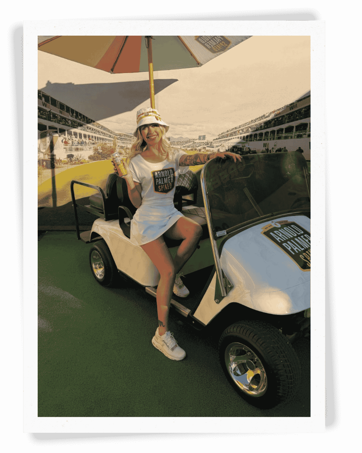 EPI Promotions Brand Ambassador in Arnold Palmer Spiked branded uniform posing on a golf cart at a premium tournament activation, representing polished beverage staffing for golf tournaments by experiential marketing agency across 35+ states