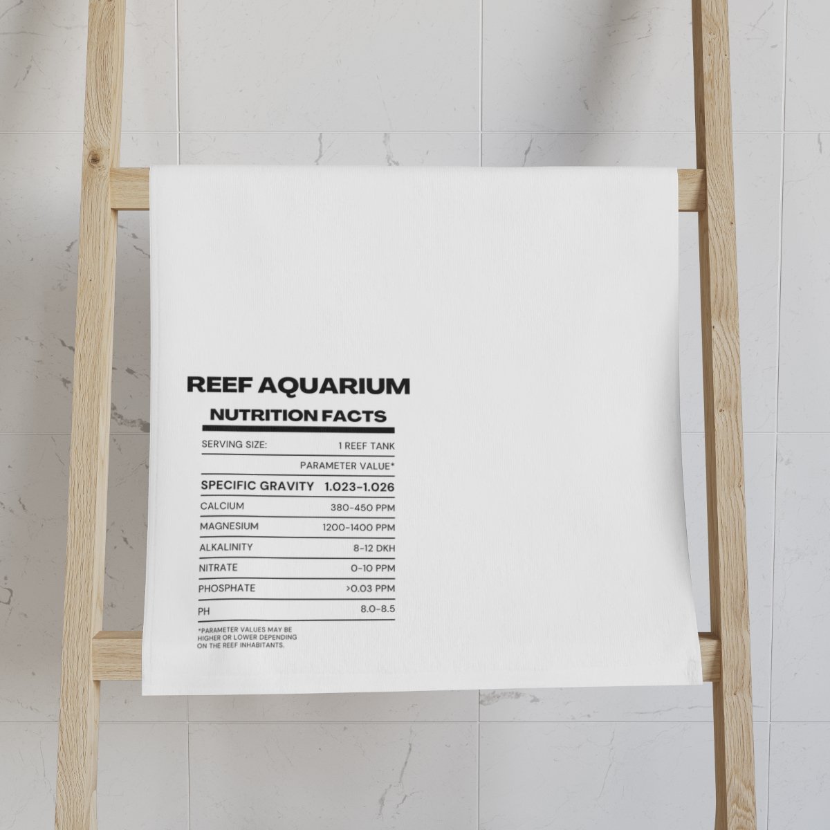 A white towel with Reef Aquarium Nutrition facts showing all parameters for saltwater aquariums including calcium, alkalinity, salinity, etc