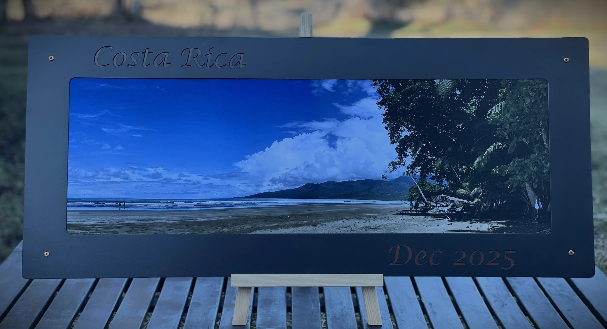 Photo frame. Selenium oxide over copper with brass rivets.
(I also happened to take this photograph)