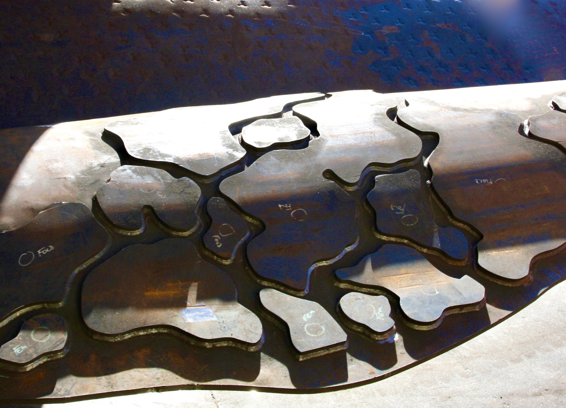 Embrace, 2016. Readable at distance high relief character.