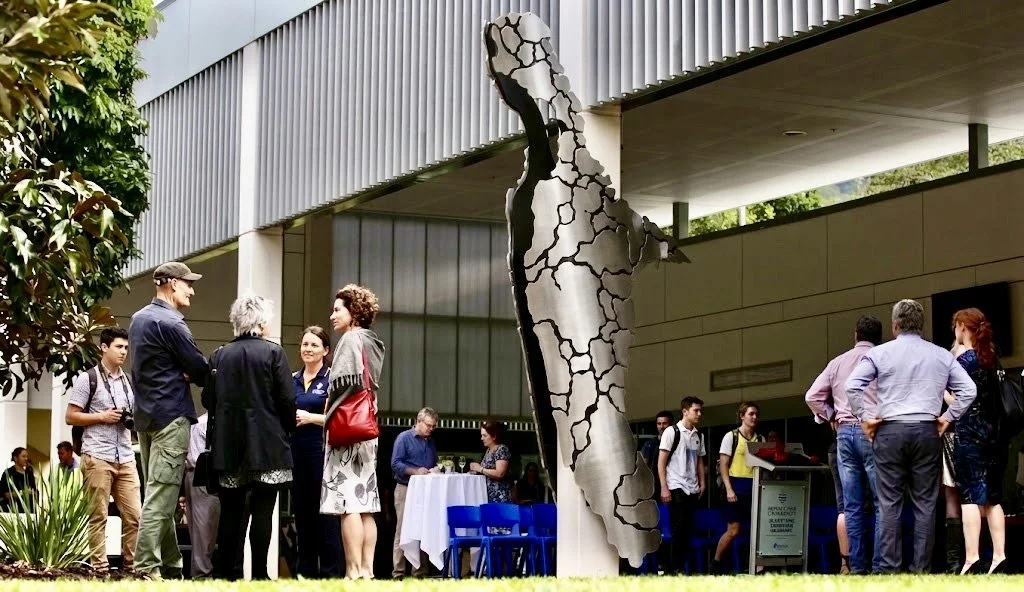 Reflection, 2016. Annealed and polished, reclaimed 40mm steel plate, 2K paint - 500cm H x240cm W x 150 cm Deep. James Cook University

