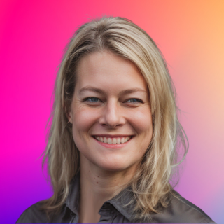 Portrait of a smiling woman with blonde hair against a colorful pink and orange background.