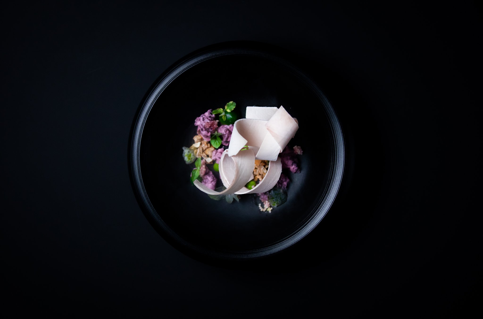 Chef Duffy's hamachi with black rice, finger limes and mint. above- Photo by Michael Muser.jpg