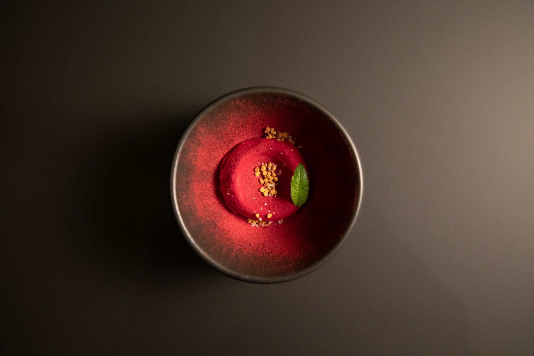 Chef Duffy's cream cheese ice cream with beet powder and pollen. Photo by Michael Muser.jpg