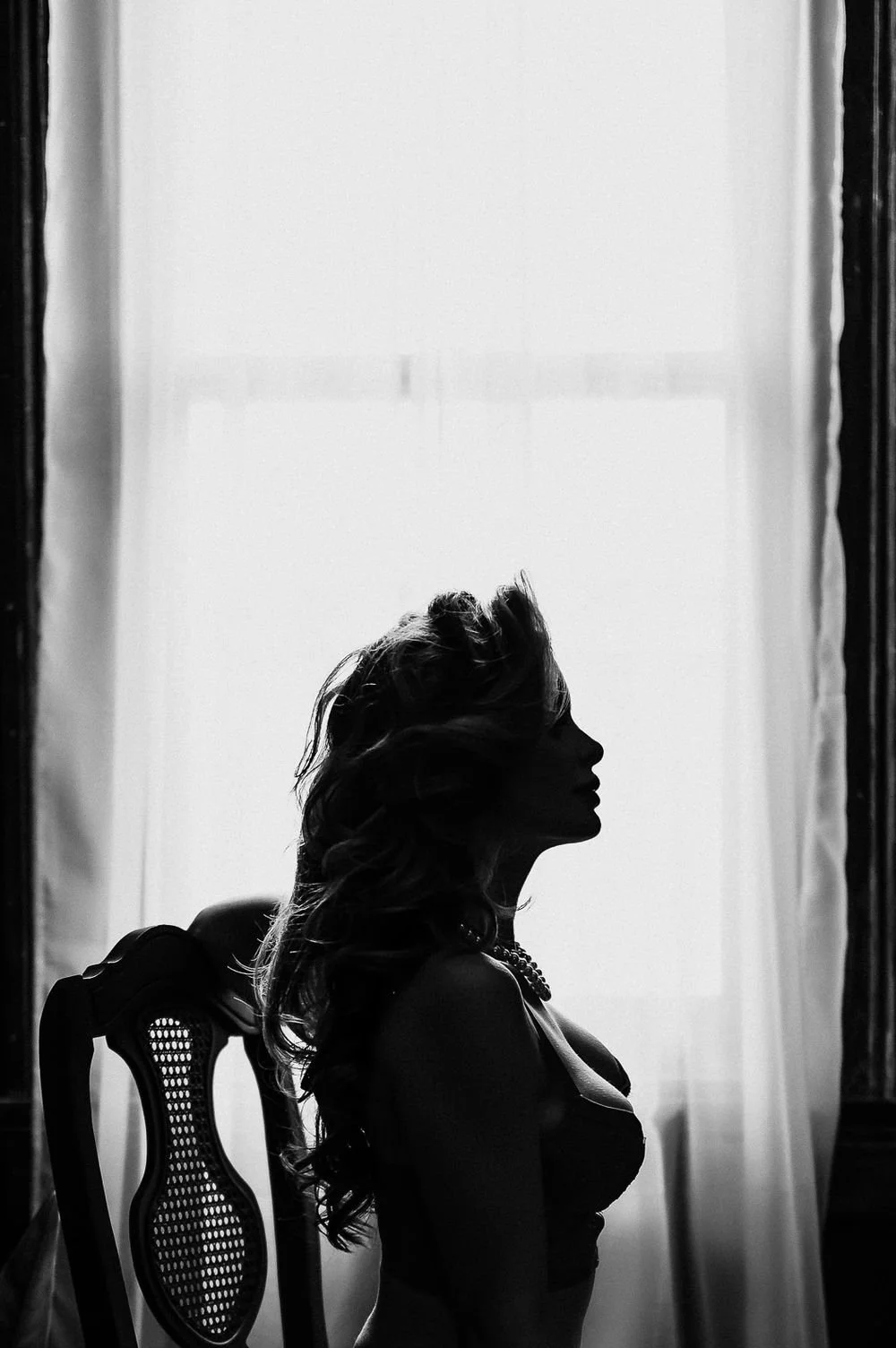 Boudoir portrait of woman by Luxury Boudoir Photographer Nue Orleans Boudoir located in New Orleans, Lousiana. 
