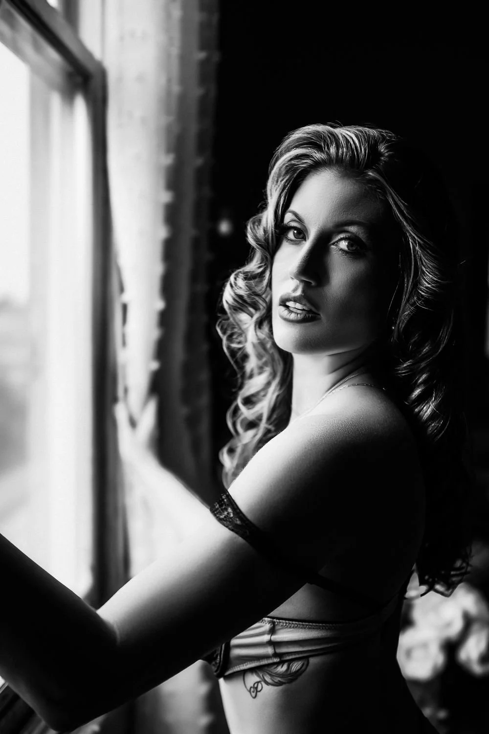 Boudoir portrait of woman by Luxury Boudoir Photographer Nue Orleans Boudoir located in New Orleans, Lousiana. 
