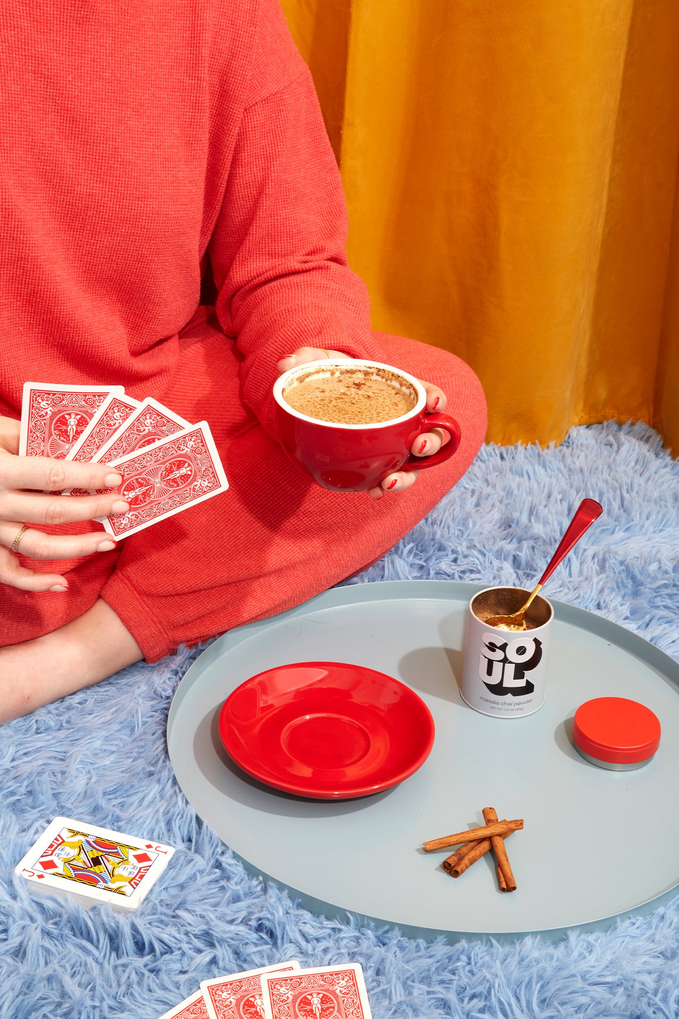 dani on rug with cards.jpg