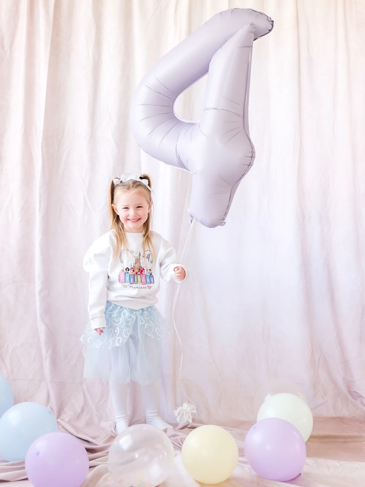 FOUR the first time in FOURever&hellip; Mazie is FOUR! 💜

These birthday milestones are some of my favorite moments to capture each year. Watching them grow, change, and become more of who they are is so special&mdash;even if it all happens far too 