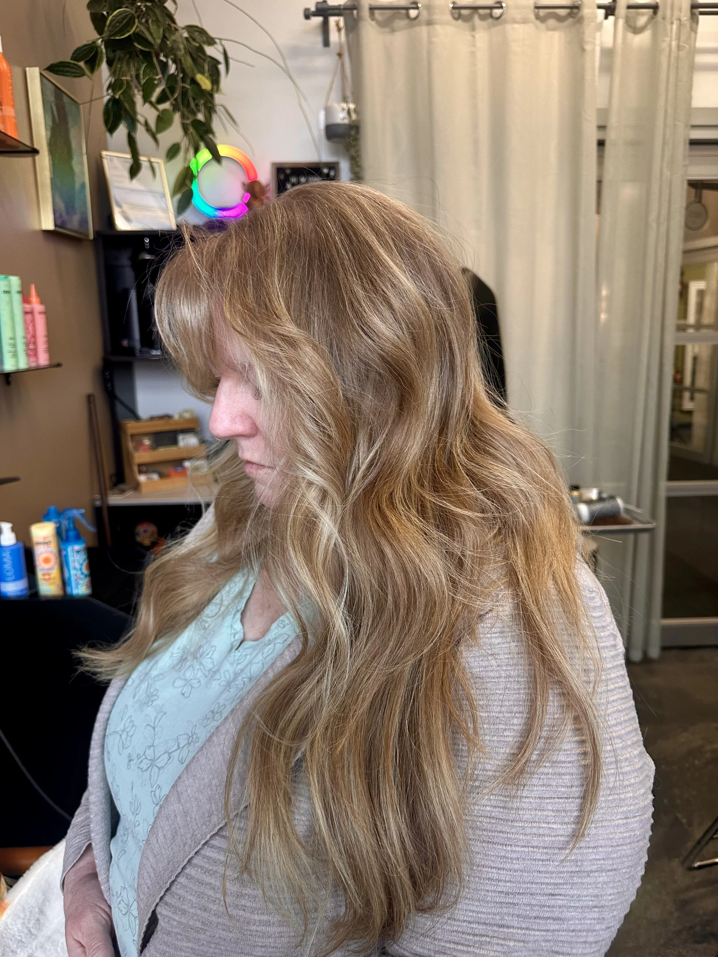 Strawberry blonde balayage with grey blending